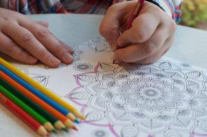 Morgan Stanley colors in her adult coloring book to relieve stress. // VF File Photo by Ashley McKean